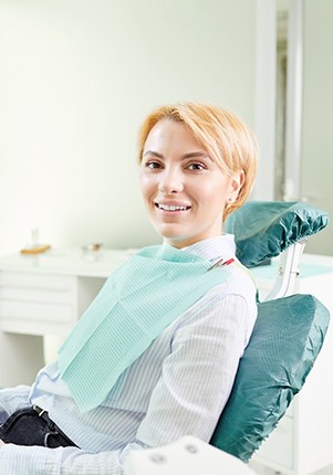 Female patient smiling after full mouth reconstruction in Mt. Pleasant, SC