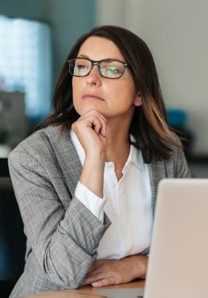 Woman considering porcelain veneers