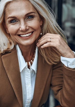 Woman surrounded by credit cards